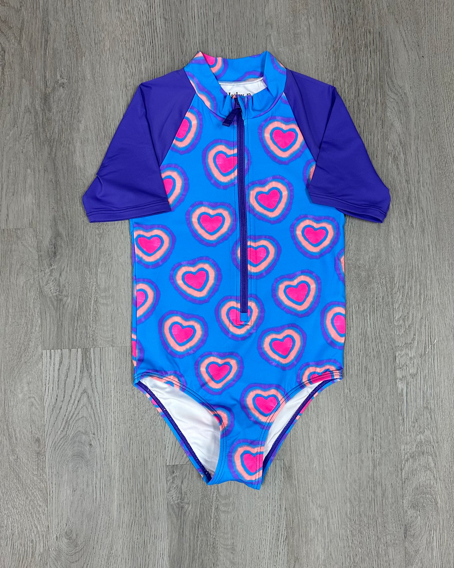 Glowing Hearts Rashguard One Piece Kids Swim Hatley